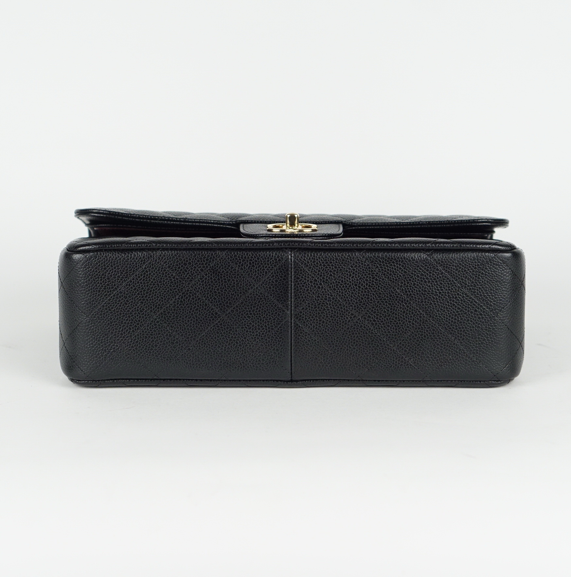 Chanel Classic Double Flap Bag Jumbo In Caviar Leather.