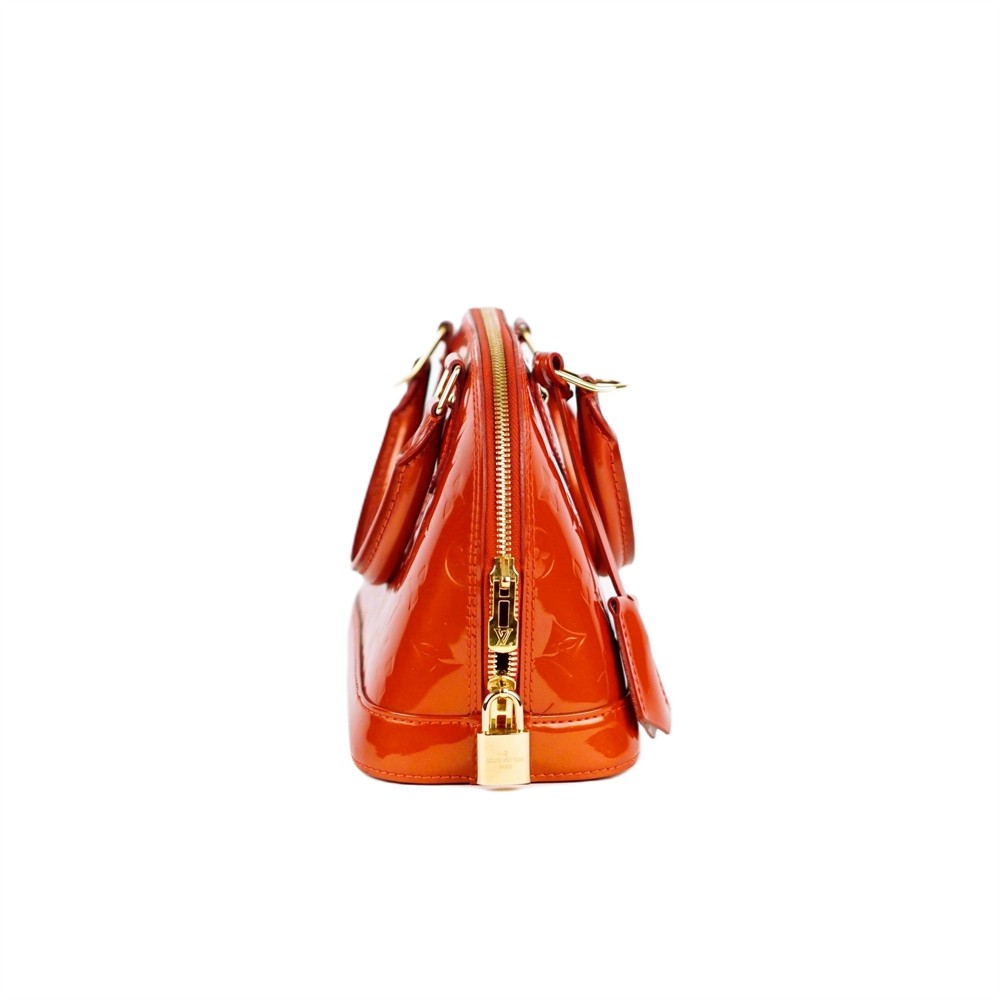 HANDTASCHE - LOUIS VUITTON ALMA BB VERNIS MONOGRAM